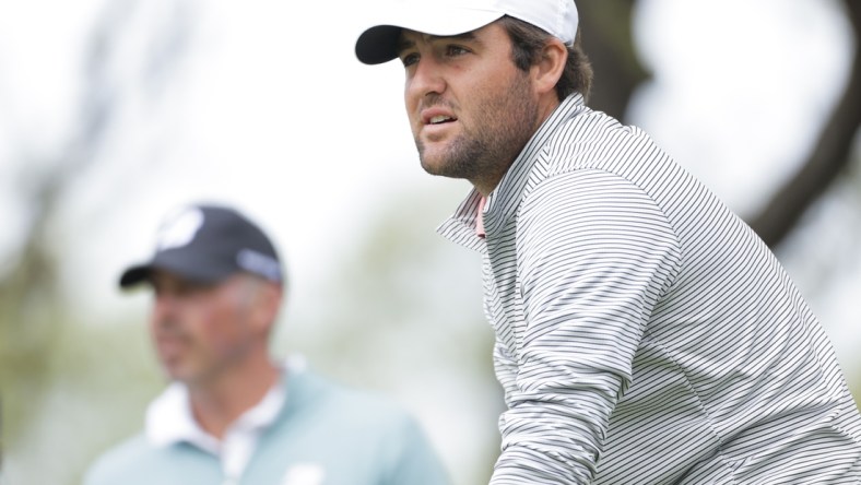 Mar 28, 2021; Austin, Texas, USA; Scottie Scheffler and Matt Kuchar on #10 tee box in the semifinal match of the final day of the WGC Dell Technologies Match Play golf tournament at Austin Country Club. Mandatory Credit: Erich Schlegel-USA TODAY Sports