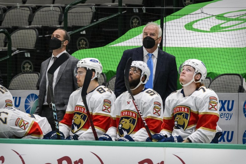 Mar 28, 2021; Dallas, Texas, USA; A view of the Florida Panthers bench and head coach Joel Norman Quenneville while medical staff attends to the injury of Florida Panthers defenseman Aaron Ekblad (not pictured) during the second period against the Dallas Stars at the American Airlines Center. Mandatory Credit: Jerome Miron-USA TODAY Sports