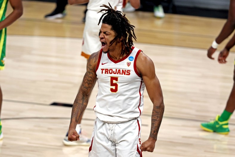 Mar 28, 2021; Indianapolis, Indiana, USA; USC Trojans guard Isaiah White (5) reacts to a play during the first half in the Sweet Sixteen of the 2021 NCAA Tournament at Bankers Life Fieldhouse. Mandatory Credit: Trevor Ruszkowski-USA TODAY Sports