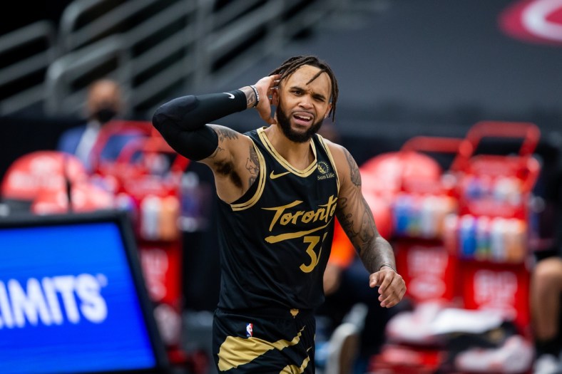 Mar 28, 2021; Tampa, Florida, USA; Toronto Raptors guard Gary Trent Jr. (33) reacts to a call during the fourth quarter against the Portland Trail Blazers at Amalie Arena. Mandatory Credit: Mary Holt-USA TODAY Sports