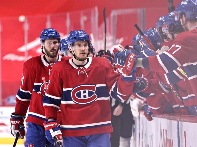 Mar 30, 2021; Montreal, Quebec, CAN; Montreal Canadiens left wing Artturi Lehkonen (62) celebrates his goal against the Edmonton Oilers with teammates during the first period at Bell Centre. Mandatory Credit: Jean-Yves Ahern-USA TODAY Sports