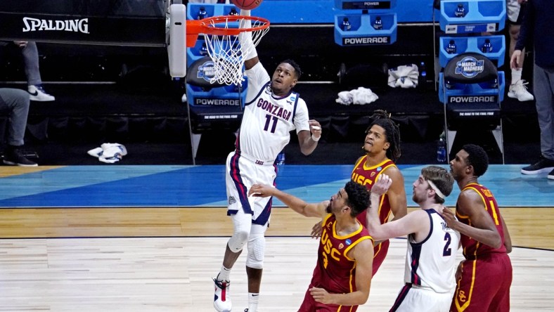 Mar 30, 2021; Indianapolis, IN, USA; Gonzaga Bulldogs guard Joel Ayayi (11) dunk the ball against USC Trojans forward Isaiah Mobley (3) during the second half in the Elite Eight of the 2021 NCAA Tournament at Lucas Oil Stadium. Mandatory Credit: Robert Deutsch-USA TODAY Sports