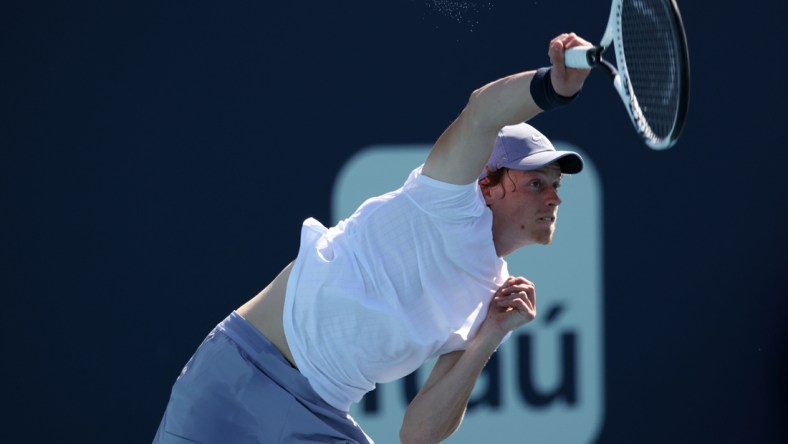 Mar 31, 2021; Miami, Florida, USA; Jannik Sinner of Italy serves against Alexander Bublik of Kazakhstan (not pictured) in a men's singles quarterfinal in the Miami Open at Hard Rock Stadium. Mandatory Credit: Geoff Burke-USA TODAY Sports