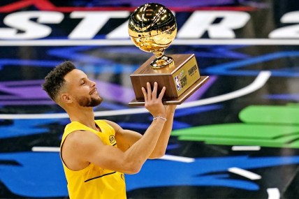 Warriors' Stephen Curry wins three-point contest.
