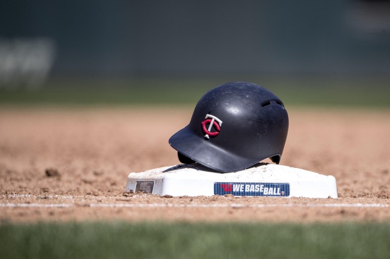 Apr 28, 2018; Minneapolis, MN, USA; A general view of a Minnesota Twins helmet on top of first base during the fifth inning against the Cincinnati Reds at Target Field. Mandatory Credit: Jesse Johnson-USA TODAY Sports
