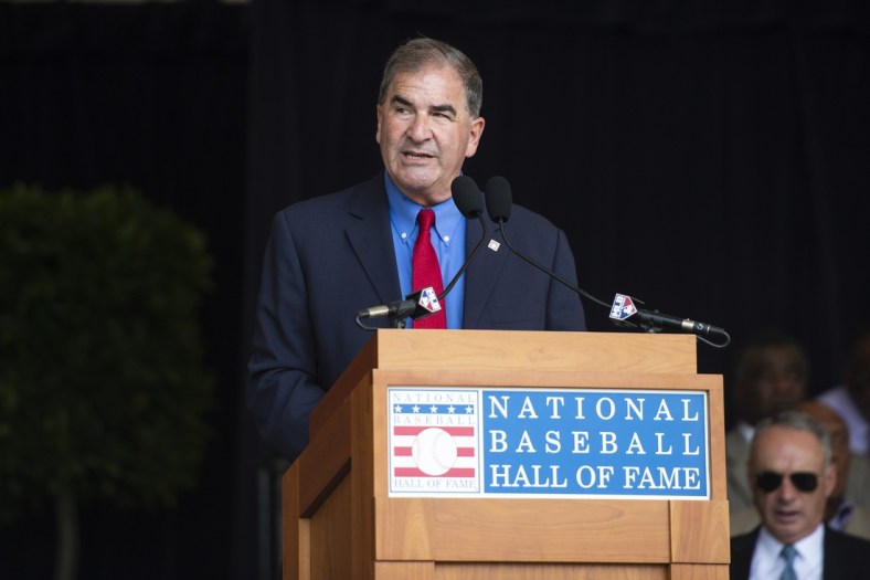 Jul 20, 2019; Cooperstown, NY, USA; Hall of Fame President Tim Mead presents Al Helfer, the Ford C. Frick Award posthumous for broadcastersat during the awards ceremony for broadcasters and writers at Doubleday Field. Mandatory Credit: Gregory J. Fisher-USA TODAY Sports