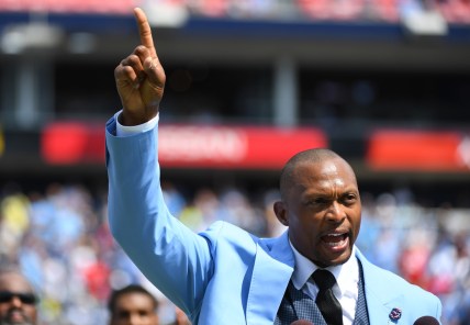 Sep 15, 2019; Nashville, TN, USA; Tennessee Titans former running back Eddie George (27) points to the sky as he talks about former teammate and Titans quarterback Steve McNair during a jersey retirement ceremony at half time of a game against the Indianapolis Colts at Nissan Stadium. Mandatory Credit: Christopher Hanewinckel-USA TODAY Sports