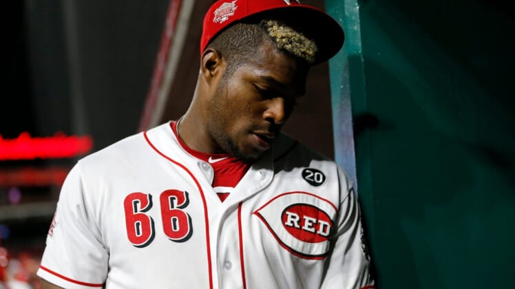 Cincinnati Reds right fielder Yasiel Puig (66) exits the field for the final time as a Reds player at the end of the top of the ninth inning of the MLB National League game between the Cincinnati Reds and the Pittsburgh Pirates at Great American Ball Park in downtown Cincinnati on Tuesday, July 30, 2019. The Pirates won 11-4.Pittsburgh Pirates At Cincinnati Reds