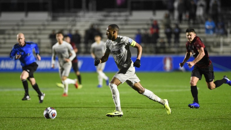 Dec 13, 2019; Cary, NC, USA; Georgetown Hoyas forward Derek Dodson (9) dribbles in the first half at WakeMed Soccer Park. Mandatory Credit: Bob Donnan-USA TODAY Sports