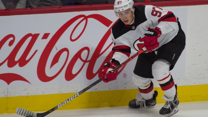 Jan 27, 2020; Ottawa, Ontario, CAN; New Jersey Devils left wing Nikita Gusev (97) skates with the puck in the third period against the Ottawa Senators at the Canadian Tire Centre. Mandatory Credit: Marc DesRosiers-USA TODAY Sports