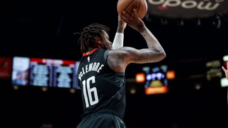 Jan 29, 2020; Portland, OR, USA; Houston Rockets guard Ben McLemore (16) shoots a three point basket against the Portland Trail Blazers during the first quarter at the Moda Center. Mandatory Credit: Craig Mitchelldyer-USA TODAY Sports