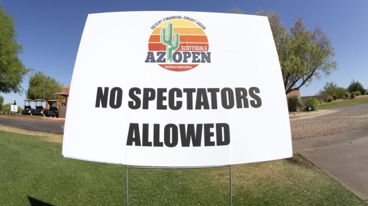 May 12, 2020; Scottsdale, Arizona, USA; No spectators allowed signs at the club house during round one at the Scottsdale AZ Open at Talking Stick Golf Club's O odham course. This is the first semi-significant sports event to take place in the Valley since the sports shutdown in March due to the coronavirus (COVID-19) pandemic. Mandatory Credit: Rob Schumacher-USA TODAY NETWORK