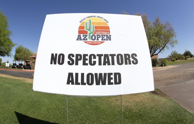 May 12, 2020; Scottsdale, Arizona, USA; No spectators allowed signs at the club house during round one at the Scottsdale AZ Open at Talking Stick Golf Club's O odham course. This is the first semi-significant sports event to take place in the Valley since the sports shutdown in March due to the coronavirus (COVID-19) pandemic. Mandatory Credit: Rob Schumacher-USA TODAY NETWORK