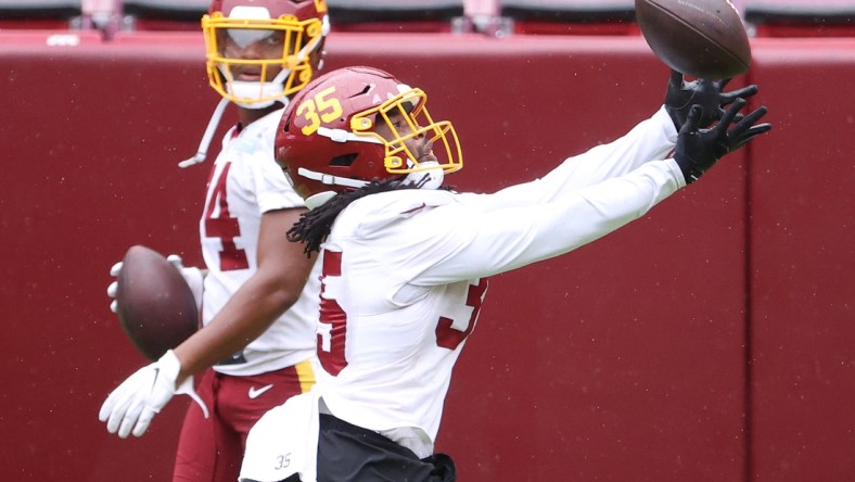 Aug 31, 2020; Washington, DC, United States; Washington Football Team running back Bryce Love (35) catches a pass during a practice at Fedex Field. Mandatory Credit: Geoff Burke-USA TODAY Sports