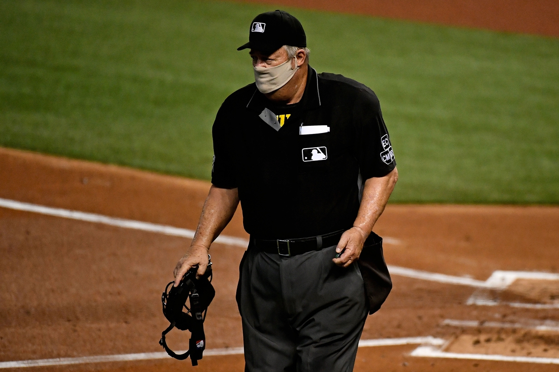 MLB umpire Joe West wins $500K from ex-player in defamation suit