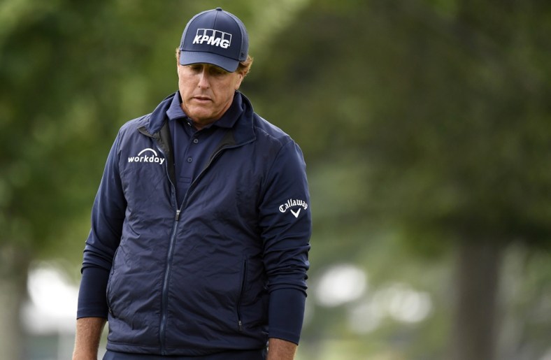 Sep 18, 2020; Mamaroneck, New York, USA; Phil Mickelson reacts after missing a putt on the second green during the second round of the U.S. Open golf tournament at Winged Foot Golf Club - West. Mandatory Credit: Danielle Parhizkaran-USA TODAY Sports