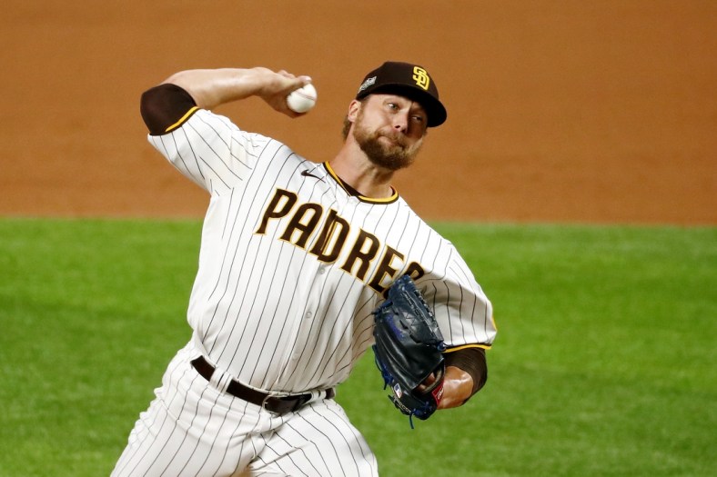 Oct 8, 2020; Arlington, Texas, USA; San Diego Padres relief pitcher Trevor Rosenthal (47), the eleventh pitcher for the team in the game, pitches against the Los Angeles Dodgers during the ninth inning during game three of the 2020 NLDS at Globe Life Field. Mandatory Credit: Kevin Jairaj-USA TODAY Sports