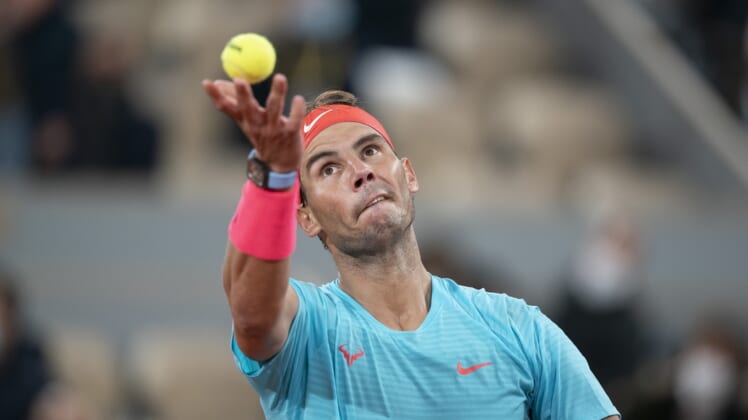 Oct 11, 2020;  Paris, France; Rafael Nadal (ESP) in action during his match against Novak Djokovic (SRB) on day 15 at Stade Roland Garros. Mandatory Credit: Susan Mullane-USA TODAY Sports