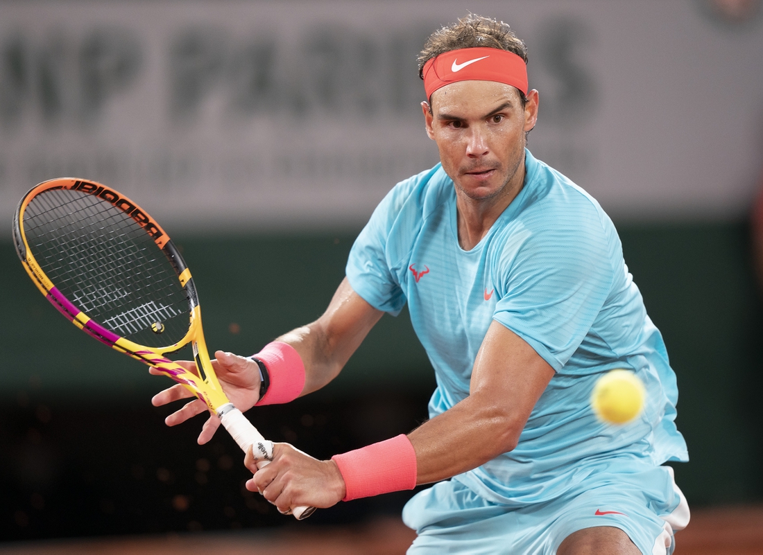 Oct 11, 2020;  Paris, France; Rafael Nadal (ESP) in action during his match against Novak Djokovic (SRB) on day 15 at Stade Roland Garros. Mandatory Credit: Susan Mullane-USA TODAY Sports