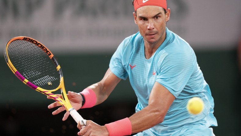 Oct 11, 2020;  Paris, France; Rafael Nadal (ESP) in action during his match against Novak Djokovic (SRB) on day 15 at Stade Roland Garros. Mandatory Credit: Susan Mullane-USA TODAY Sports