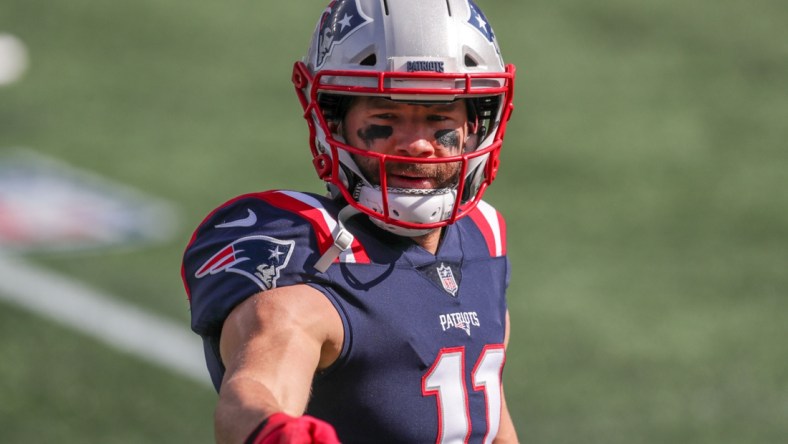 Oct 18, 2020; Foxborough, Massachusetts, USA; New England Patriots receiver Julian Edelman (11) warms up prior to the game against the Denver Broncos at Gillette Stadium. Mandatory Credit: Paul Rutherford-USA TODAY Sports