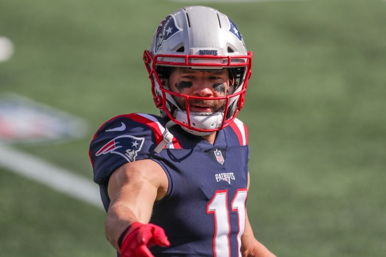 Oct 18, 2020; Foxborough, Massachusetts, USA; New England Patriots receiver Julian Edelman (11) warms up prior to the game against the Denver Broncos at Gillette Stadium. Mandatory Credit: Paul Rutherford-USA TODAY Sports