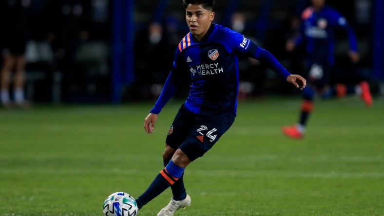 Oct 24, 2020; Cincinnati, OH, USA; FC Cincinnati midfielder Frankie Amaya (24) controls the ball against Minnesota United FC in the first half at Nippert Stadium. Mandatory Credit: Aaron Doster-USA TODAY Sports