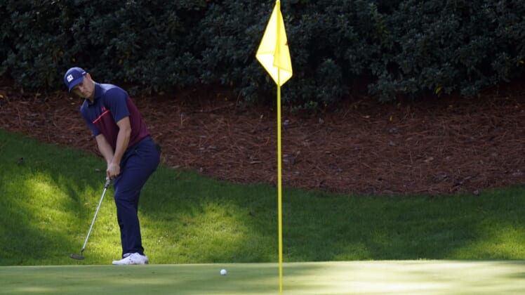 Nov 12, 2020; Augusta, Georgia, USA; Jordan Spieth putts on the 13th green during the first round of The Masters golf tournament at Augusta National GC. Mandatory Credit: Rob Schumacher-USA TODAY Sports