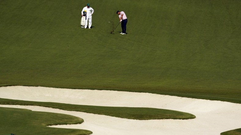 Nov 14, 2020; Augusta, Georgia, USA; Bryson DeChambeau plays his shot from the tenth fairway during the third round of The Masters golf tournament at Augusta National GC. Mandatory Credit: Rob Schumacher-USA TODAY Sports