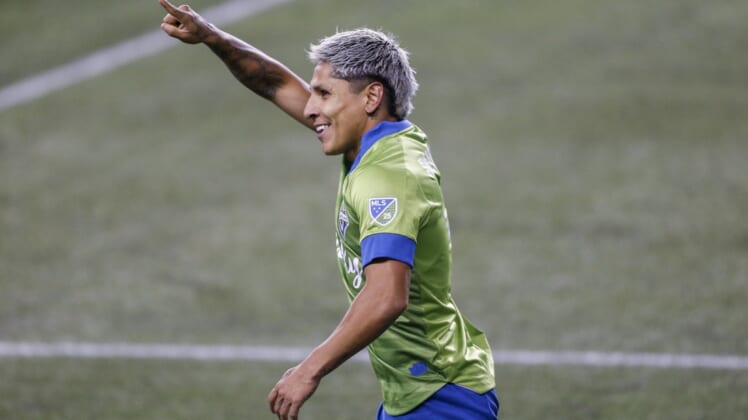 Nov 24, 2020; Seattle, Washington, USA; Seattle Sounders FC forward Raul Ruidiaz (9) celebrates after scoring a goal against the Los Angeles FC during the second half at Lumen Field. Mandatory Credit: Joe Nicholson-USA TODAY Sports