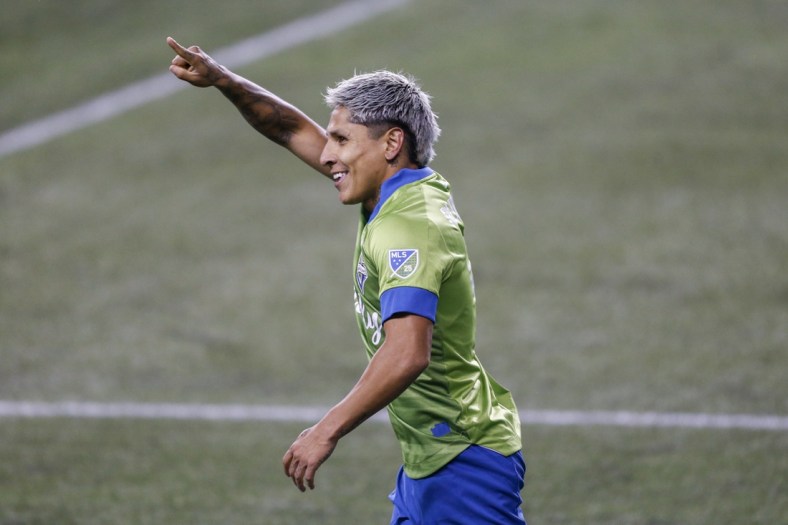 Nov 24, 2020; Seattle, Washington, USA; Seattle Sounders FC forward Raul Ruidiaz (9) celebrates after scoring a goal against the Los Angeles FC during the second half at Lumen Field. Mandatory Credit: Joe Nicholson-USA TODAY Sports