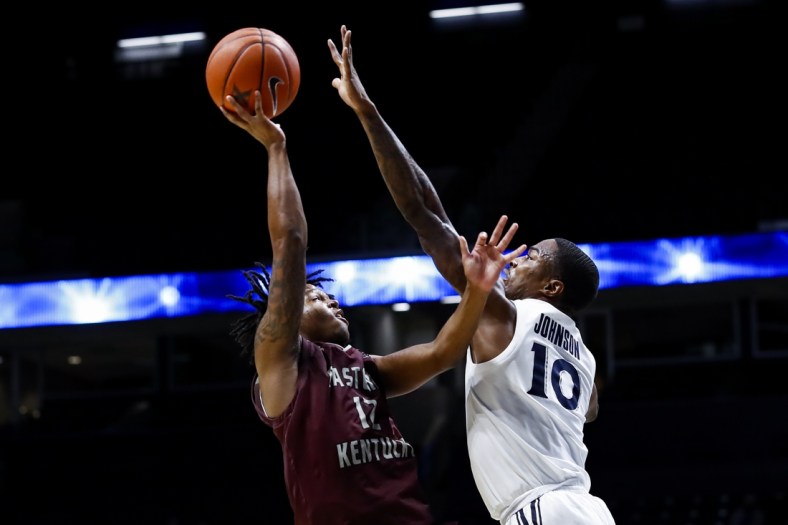 Nov 30, 2020; Cincinnati, Ohio, USA; Eastern Kentucky Colonels guard Wendell Green Jr. (12) drives to the basket against Xavier Musketeers guard Nate Johnson (10) in the second half at the Cintas Center. Mandatory Credit: Aaron Doster-USA TODAY Sports