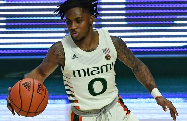 Nov 29, 2020; Coral Gables, Florida, USA; Miami Hurricanes guard Chris Lykes (0) dribbles the ball up the court against the North Florida Ospreys during the first half at Watsco Center. Mandatory Credit: Jasen Vinlove-USA TODAY Sports