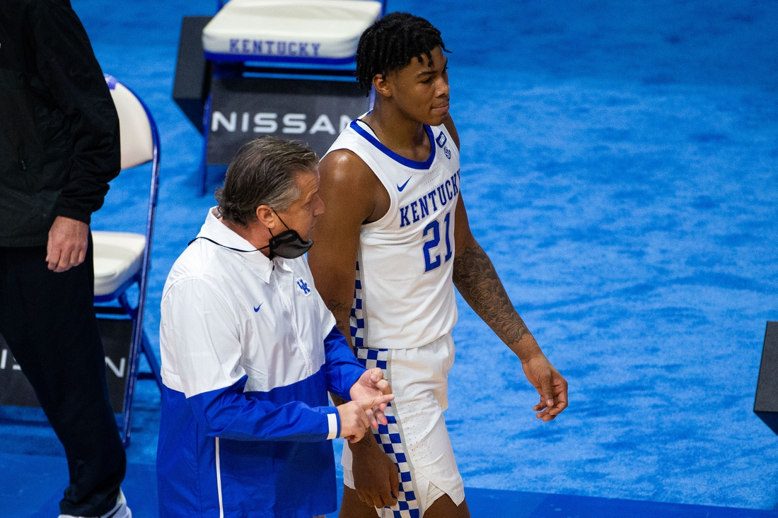 Nov 29, 2020; Lexington, Kentucky, USA; Kentucky Wildcats head coach John Calipari talks with forward Cam'ron Fletcher (21) in the first half against the Richmond Spiders at Rupp Arena at Central Bank Center. Mandatory Credit: Jordan Prather-USA TODAY Sports