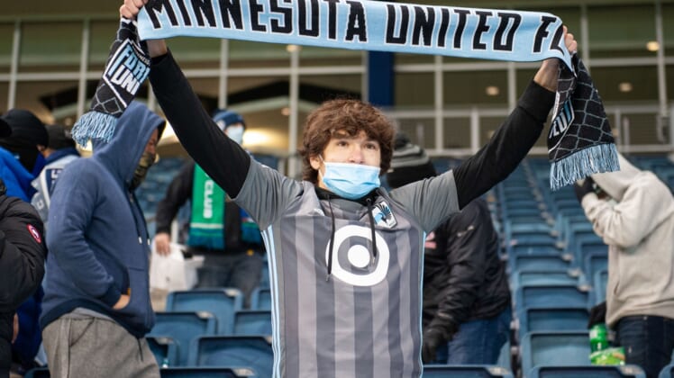 Dec 3, 2020; Kansas City, Kansas, USA; A Minnesota United FC fan cheers in the second half against Sporting Kansas City at Children's Mercy Park. Mandatory Credit: Amy Kontras-USA TODAY Sports