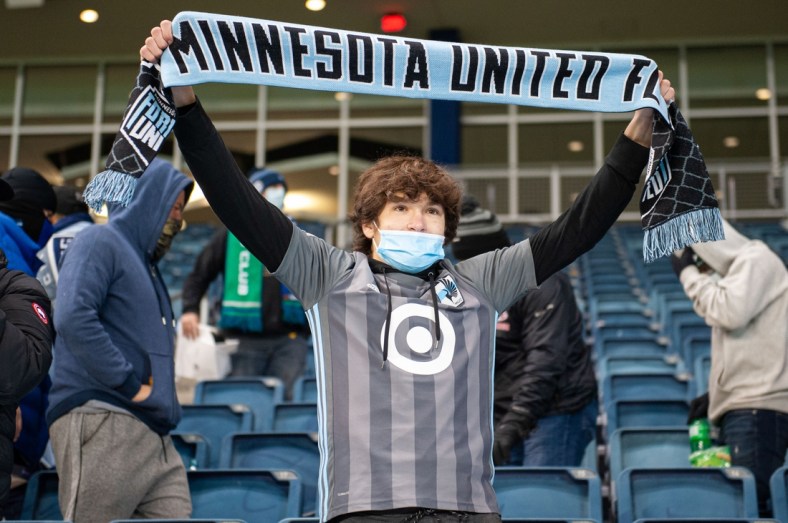 Dec 3, 2020; Kansas City, Kansas, USA; A Minnesota United FC fan cheers in the second half against Sporting Kansas City at Children's Mercy Park. Mandatory Credit: Amy Kontras-USA TODAY Sports