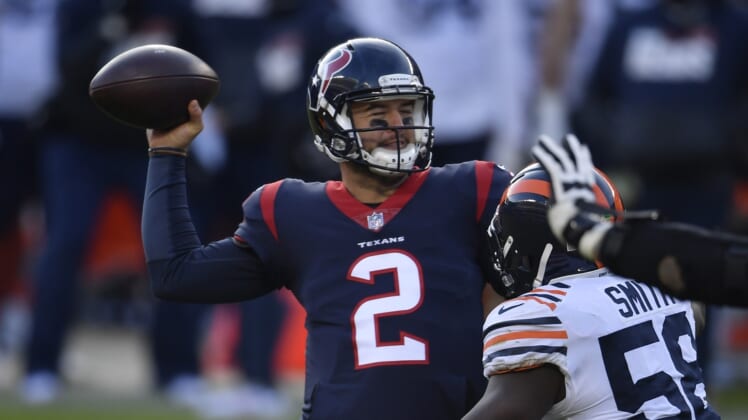 Dec 13, 2020; Chicago, Illinois, USA; Houston Texans quarterback AJ McCarron (2) passes in the second half against Chicago Bears inside linebacker Roquan Smith (58) at Soldier Field. Mandatory Credit: Quinn Harris-USA TODAY Sports
