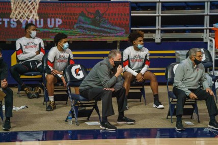 Dec 19, 2020; Berkeley, California, USA; Cal State Northridge Matadors head coach Mark Gottfried and team are socially distant during the game against the California Golden Bears during the first half at Haas Pavilion. Mandatory Credit: Neville E. Guard-USA TODAY Sports
