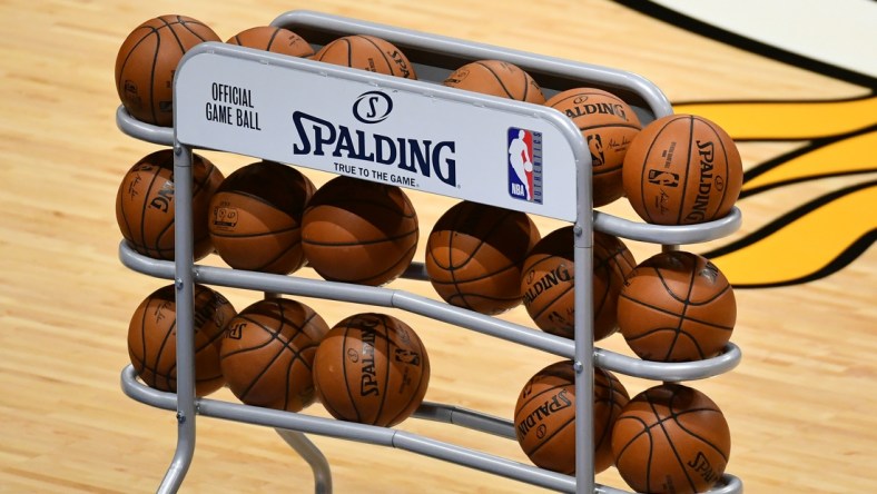 Dec 25, 2020; Miami, Florida, USA; A general view of a rack of basketballs on the court prior to the game between the Miami Heat and the New Orleans Pelicans at American Airlines Arena. Mandatory Credit: Jasen Vinlove-USA TODAY Sports