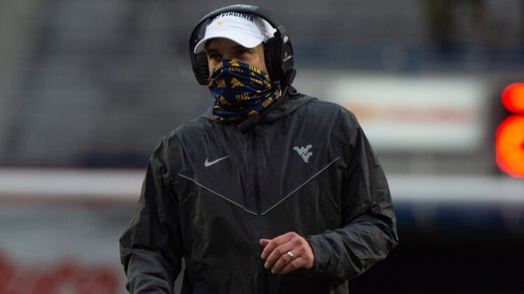 Dec 31, 2020; Memphis, TN, USA; West Virginia Mountaineers head coach Neal Brown during the first half against the Army Black Knights  at Liberty Bowl Stadium. Mandatory Credit: Justin Ford-USA TODAY Sports