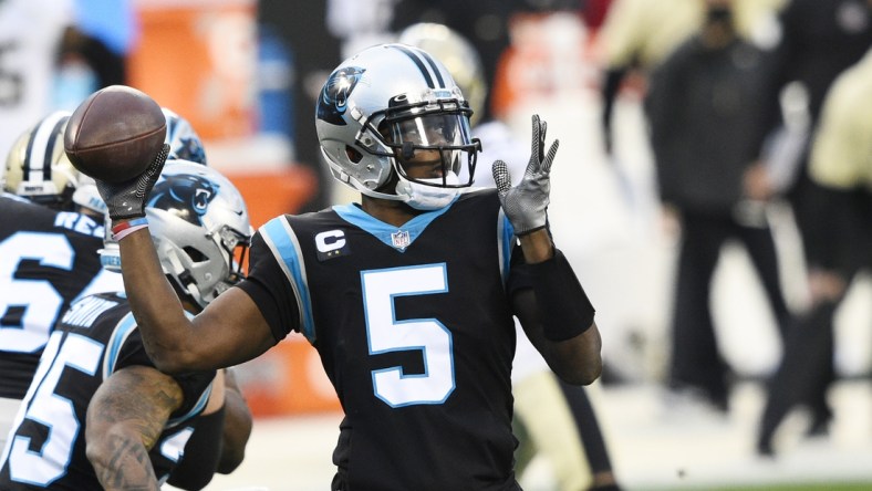 Jan 3, 2021; Charlotte, North Carolina, USA; Carolina Panthers quarterback Teddy Bridgewater (5) looks to pass in the first quarter at Bank of America Stadium. Mandatory Credit: Bob Donnan-USA TODAY Sports