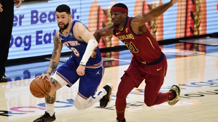 Jan 15, 2021; Cleveland, Ohio, USA; New York Knicks guard Austin Rivers (8) drives to the basket against Cleveland Cavaliers guard Damyean Dotson (21) during the fourth quarter at Rocket Mortgage FieldHouse. Mandatory Credit: Ken Blaze-USA TODAY Sports