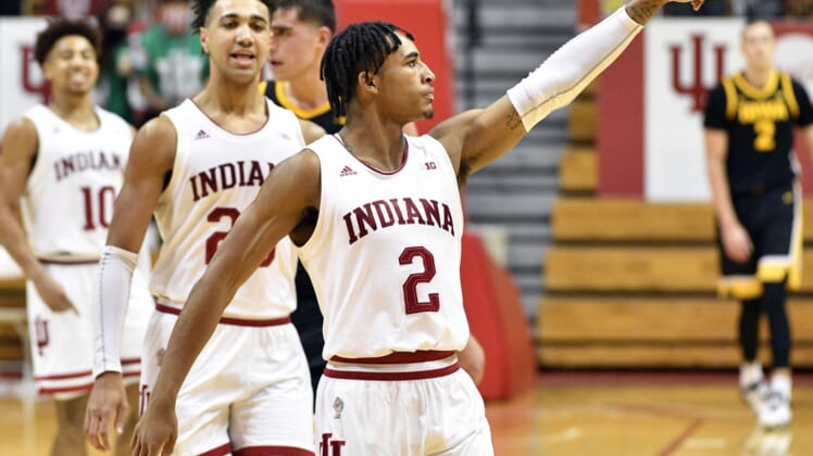 Feb 7, 2021; Bloomington, Indiana, USA; Indiana Hoosiers guard Armaan Franklin (2) points at the few fans in the stands after scoring a basket in the final second of the game to take the lead during the game at Simon Skjodt Assembly Hall. The Indiana Hoosiers defeated the Iowa Hawkeyes 67 to 65.  Mandatory Credit: Marc Lebryk-USA TODAY Sports