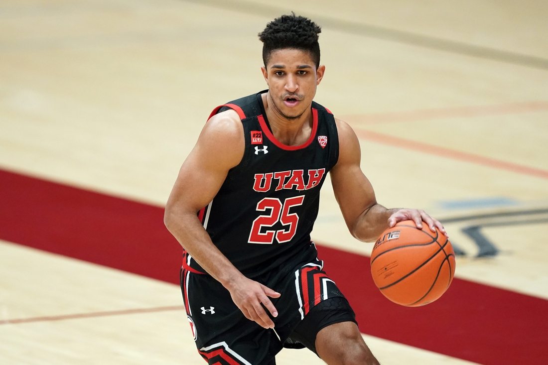 Feb 13, 2021; Stanford, California, USA; Utah Utes guard Alfonso Plummer (25) handles the ball during the second half against the Stanford Cardinal at Maples Pavilion. Mandatory Credit: Darren Yamashita-USA TODAY Sports