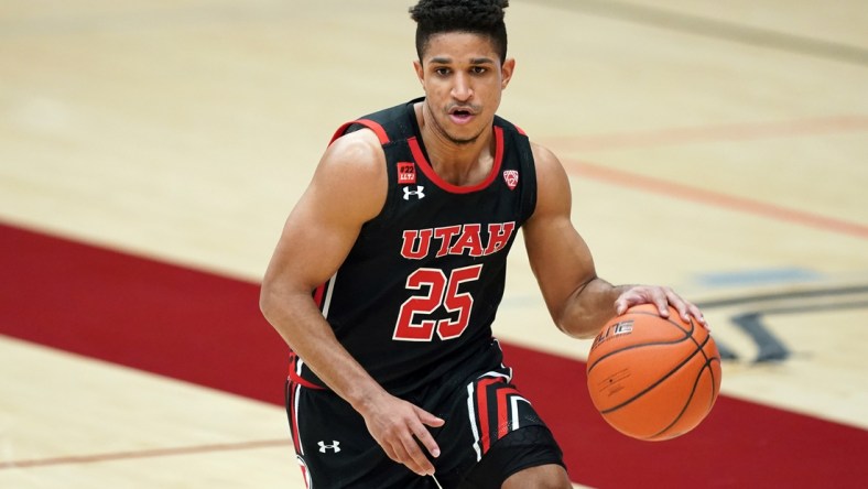 Feb 13, 2021; Stanford, California, USA; Utah Utes guard Alfonso Plummer (25) handles the ball during the second half against the Stanford Cardinal at Maples Pavilion. Mandatory Credit: Darren Yamashita-USA TODAY Sports