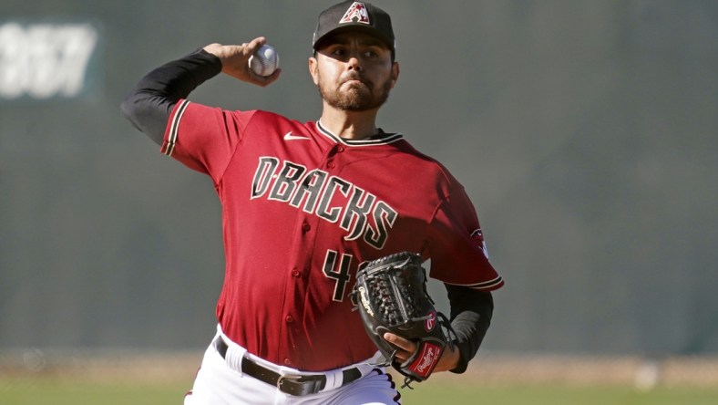 Feb 22, 2021; Scottsdale, Arizona, USA; Arizona Diamondbacks pitcher Joakim Soria (48) throws during spring training workouts at Salt River Fields at Talking Stick. Mandatory Credit: Rob Schumacher/Arizona Republic-USA TODAY Sports