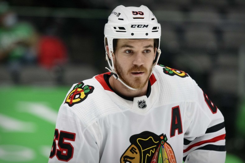 Feb 9, 2021; Dallas, Texas, USA; Chicago Blackhawks right wing Andrew Shaw (65) in action during the game between the Dallas Stars and the Chicago Blackhawks at the American Airlines Center. Mandatory Credit: Jerome Miron-USA TODAY Sports