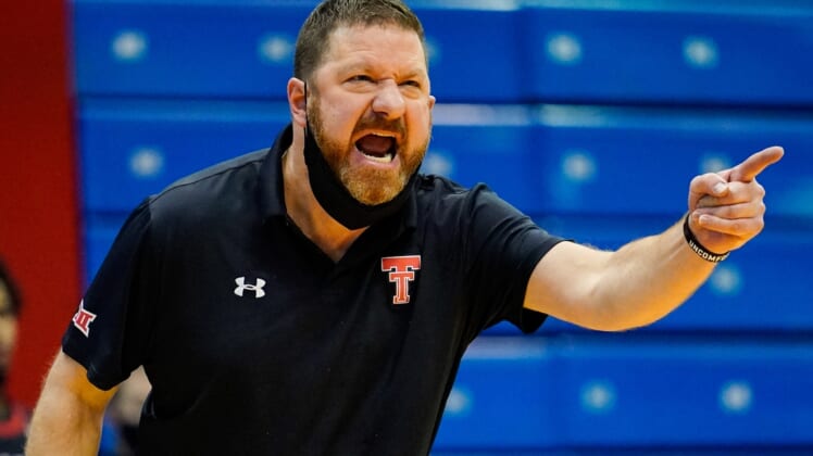 Feb 20, 2021; Lawrence, Kansas, USA; Texas Tech Red Raiders head coach Chris Beard reacts after a play against the Kansas Jayhawks during the first half at Allen Fieldhouse. Mandatory Credit: Jay Biggerstaff-USA TODAY Sports