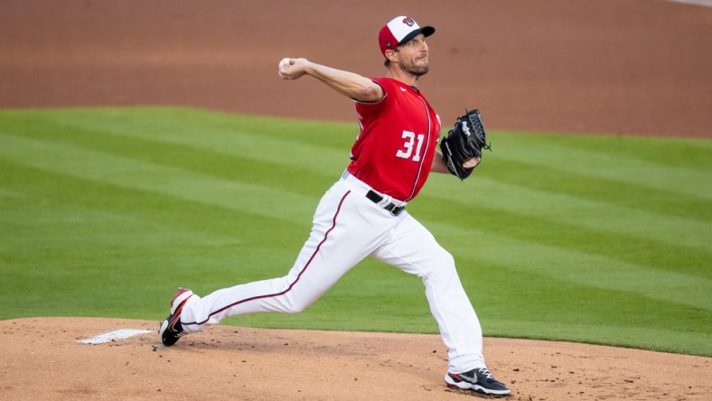 Mar 5, 2021; West Palm Beach, Florida, USA; Washington Nationals starting pitcher Max Scherzer (31) delivers a pitch against the St. Louis Cardinals during the first inning of a spring training game at FITTEAM Ballpark of the Palm Beaches. Mandatory Credit: Mary Holt-USA TODAY Sports