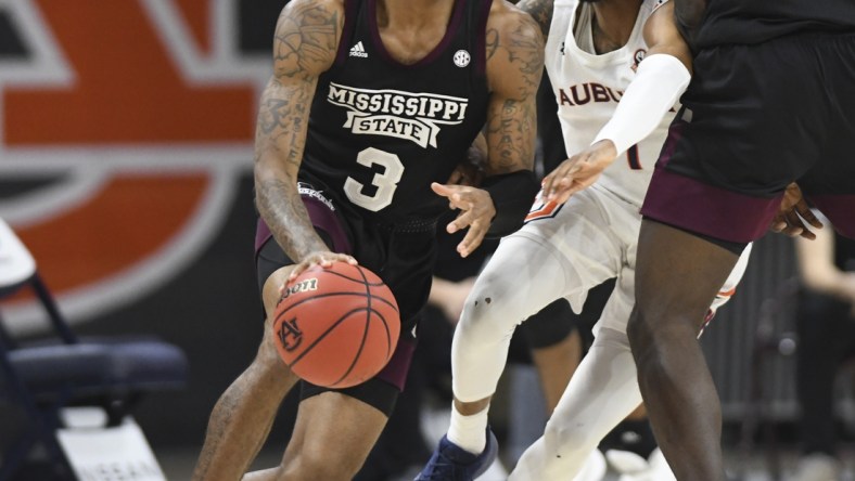 Mar 6, 2021; Auburn, Alabama, USA; Auburn Tigers guard Jamal Johnson (1) gets picked off Mississippi State Bulldogs guard D.J. Stewart Jr. (3) during the second half between the Auburn Tigers and the Mississippi State Bulldogs at Auburn Arena. Mandatory Credit: Julie Bennett-USA TODAY Sports